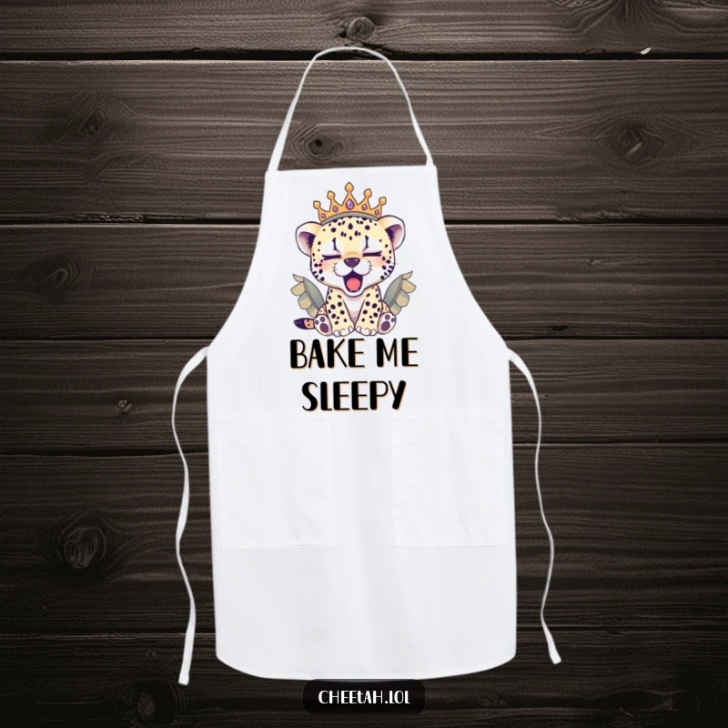 Funny sleepy cheetah cub in a feathered crown yawning, this apron brings cozy humor to the kitchen.