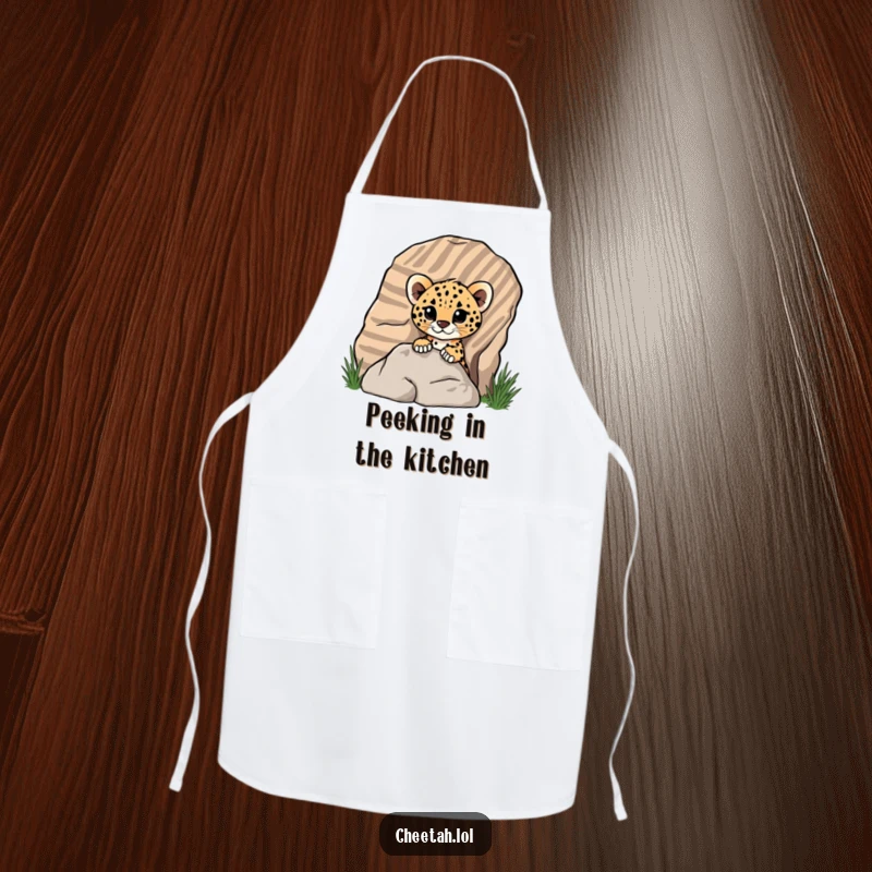 Funny cheetah cub peeking from a striped rock on a kitchen apron, adding playful charm for screen readers.