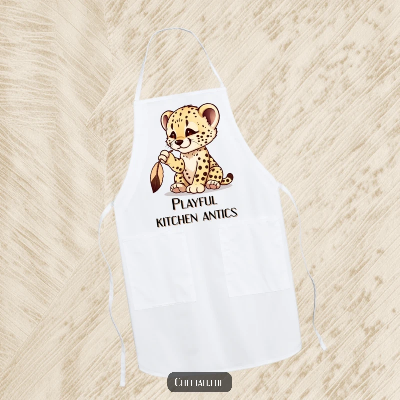Funny cheetah cub apron showing a playful cub batting at a dangling feather, ready to cook.