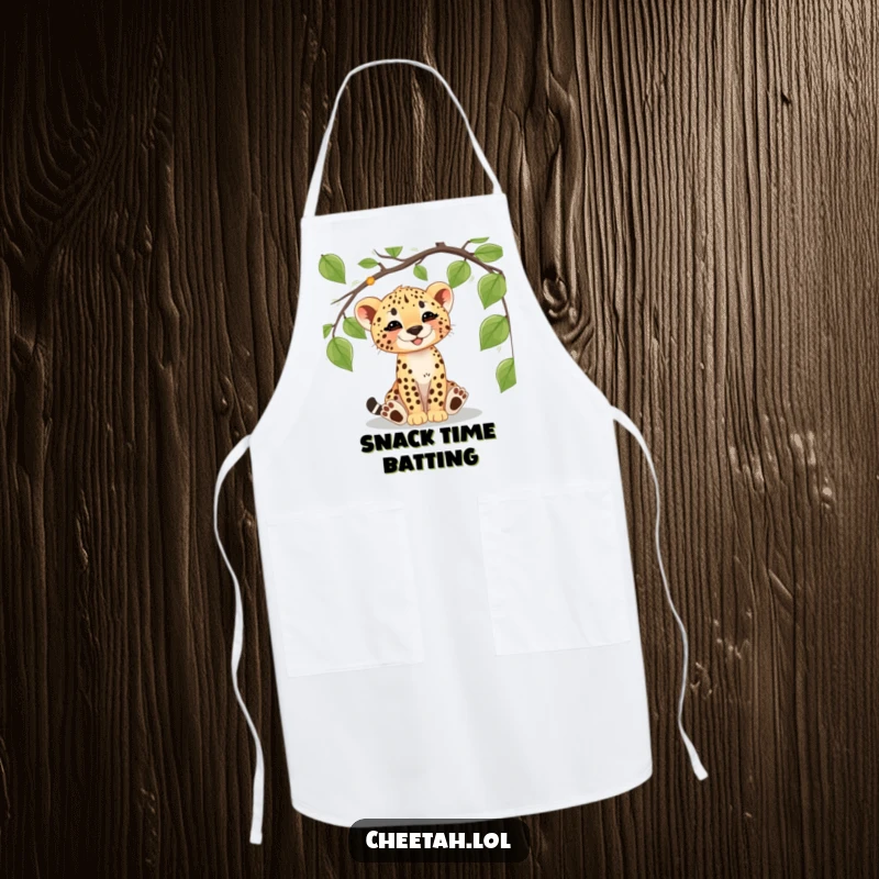Funny cheetah cub apron showing a playful cub batting at a vine, perfect for a fun-loving cook or baker.