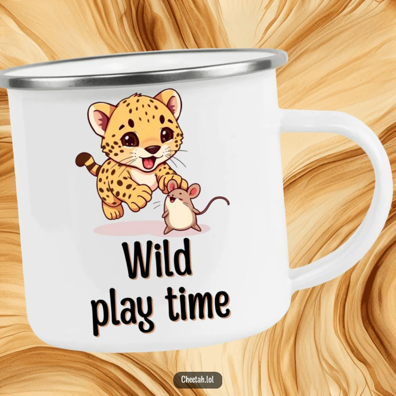 Funny cheetah cub excitedly pouncing on a bouncing toy mouse on a camping mug, perfect for outdoor enjoyment.