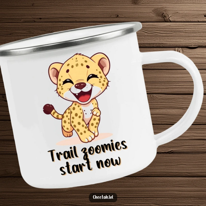 Funny camping mug showing a cheetah cub enthusiastically chasing its tail, perfect for outdoor adventures and morning coffee.