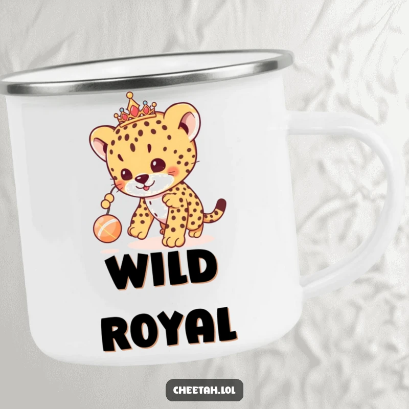 Funny cheetah cub camping mug showing a royal cub with a tiara, playfully chasing a toy, perfect for humorous outdoor activities.