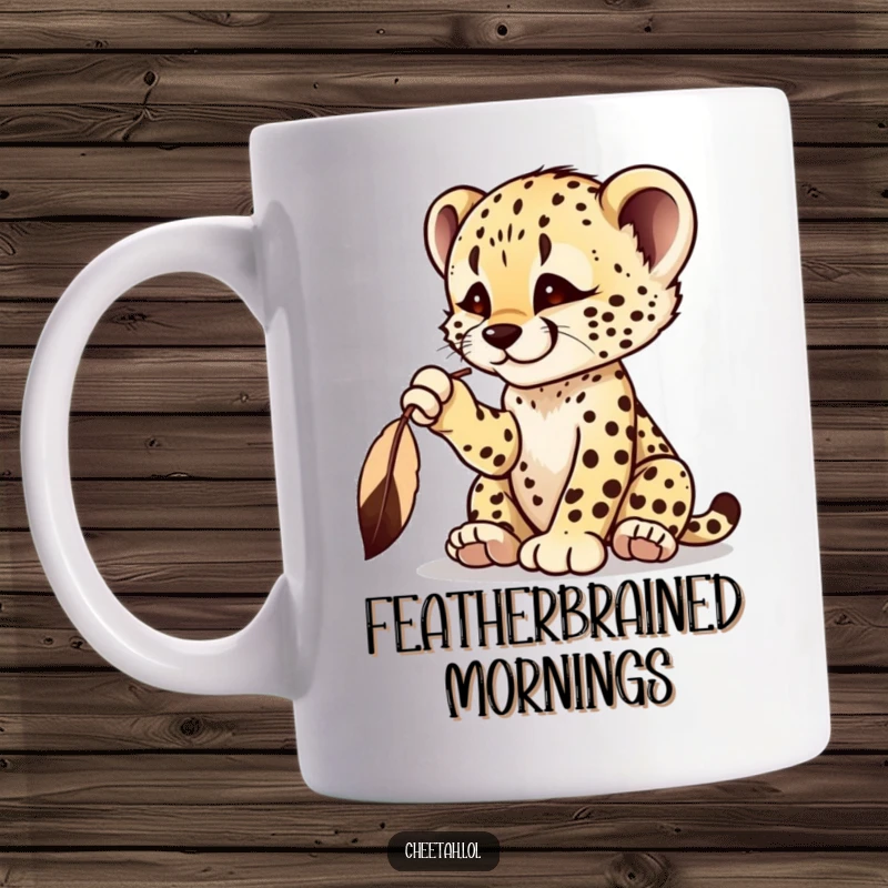Funny cheetah cub mug featuring a playful cub batting at a dangling feather with intense focus.
