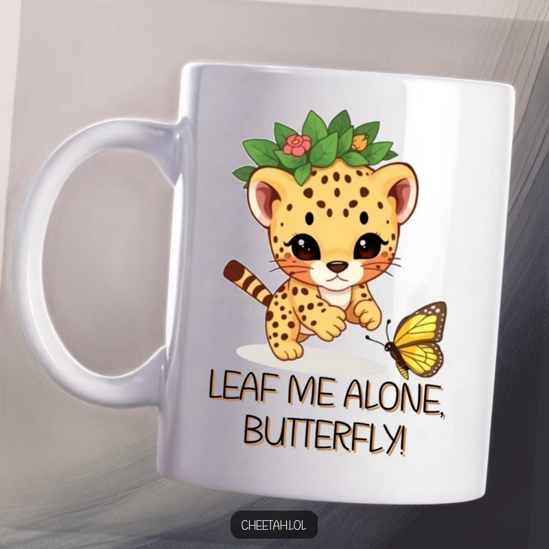 Funny cheetah cub with a leaf crown playfully pouncing on a butterfly, looking mischievous and full of energy on a mug.