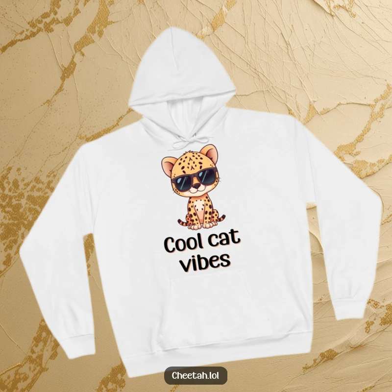 Funny kawaii cheetah wearing sunglasses, posing coolly on a hoodie, perfect for casual, stylish wear.