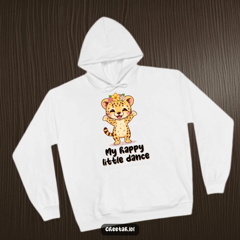 Funny cheetah cub wearing a flower crown, doing a joyful jig, printed on a cozy hoodie for ultimate comfort and playful style.