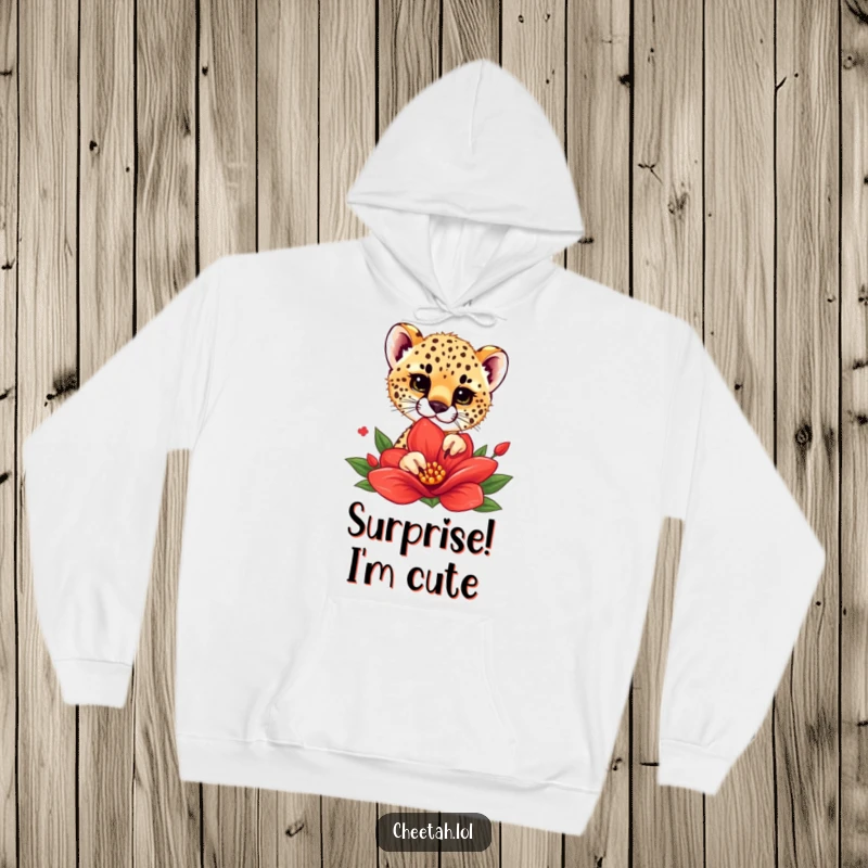 Funny hoodie depicting a cheetah cub playfully peeking from behind a large, bright red flower, exuding curiosity and sweetness.