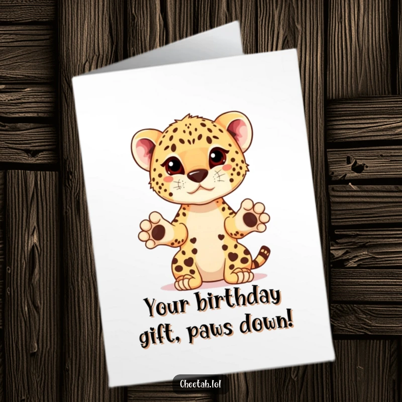 Funny Free Printable Birthday Card showing a cheerful cheetah cub extending its paws to present an imaginary prize.