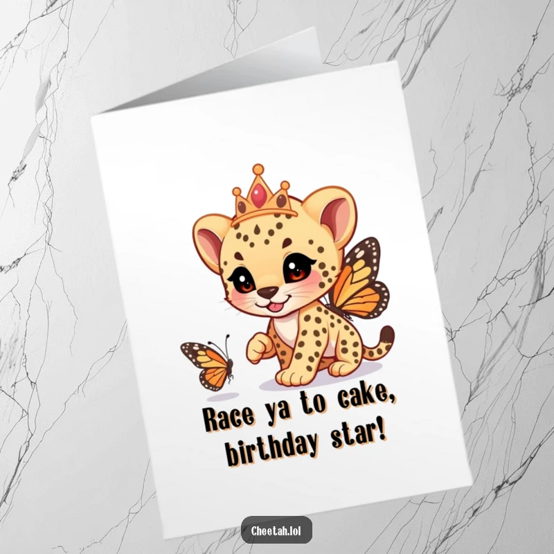 Funny Free Printable Birthday Card: Cheetah cub with tiara playfully chases a butterfly, celebrating birthdays.