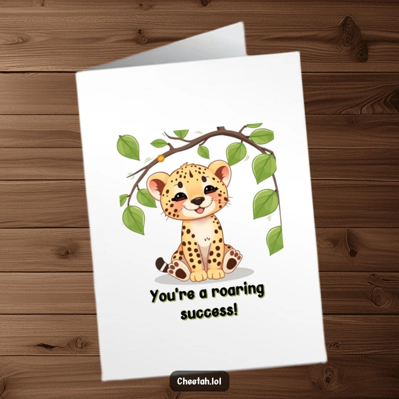 Funny Free Printable Congratulations Card: A cheetah cub happily batting at a dangling vine, celebrating a win with joy.