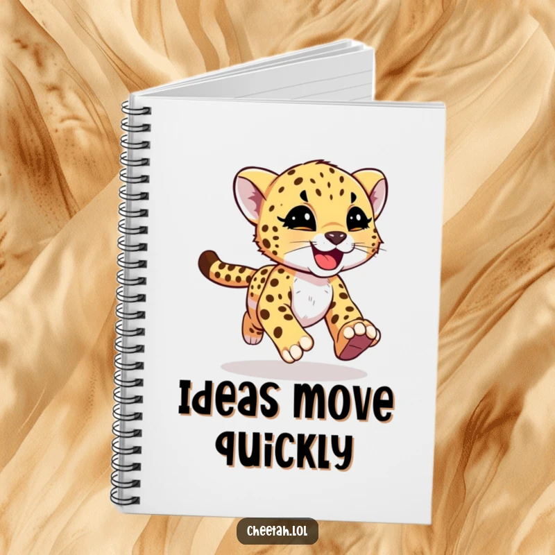 Funny cheetah cub with joyful motion streaks on a notebook, symbolizing swift ideas for screen readers.