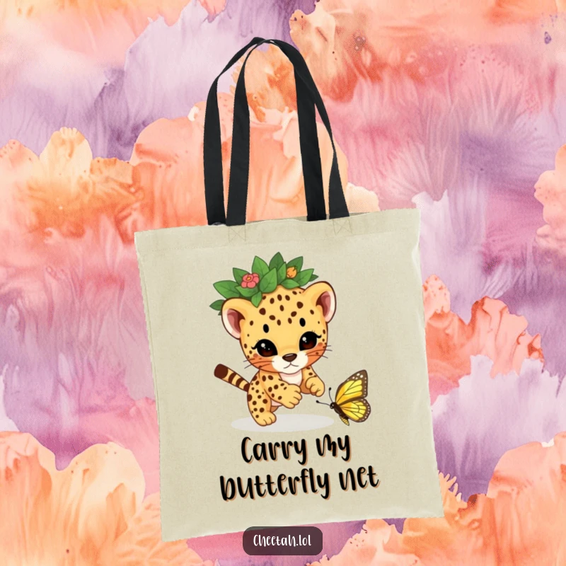 Funny cheetah cub with a leaf crown, playfully pouncing on a butterfly, illustrated on a durable tote bag for a stylish statement.