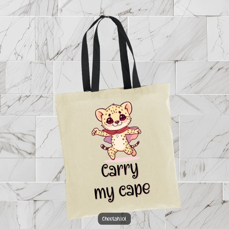 Funny cheetah cub tote bag featuring a cub in a sparkly cape, striking a heroic pose, perfect for carrying items with a bold theme.