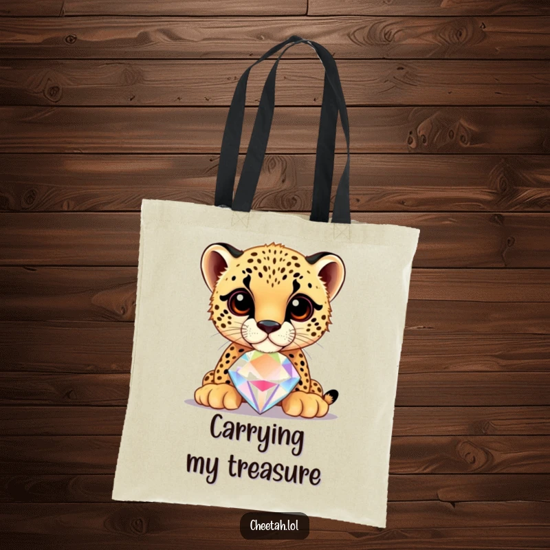 Funny cheetah cub balancing a large, shiny jewel on its nose, on a tote bag, perfect for carrying essentials.