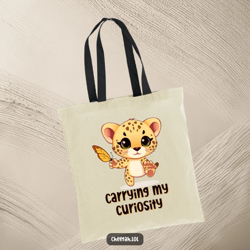 Funny cheetah cub playfully chasing a butterfly with wide eyes, a playful and humorous design on this practical tote bag.