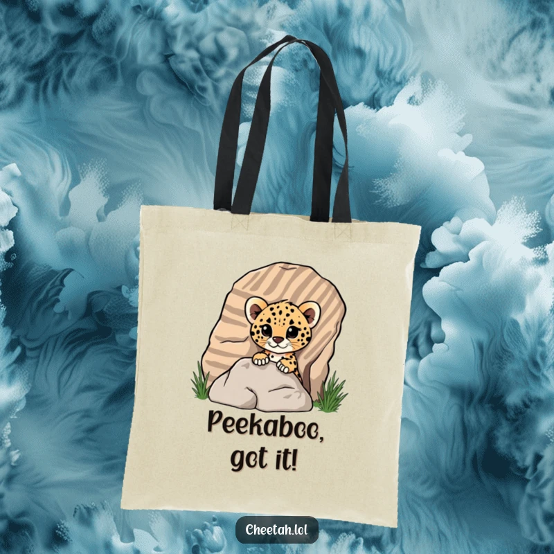 Funny cheetah cub peeking from a striped rock on a tote bag, showcasing its playful nature for screen readers.